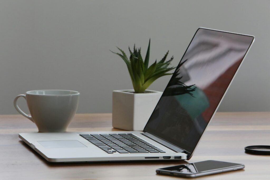 Laptop on the table with coffee mug